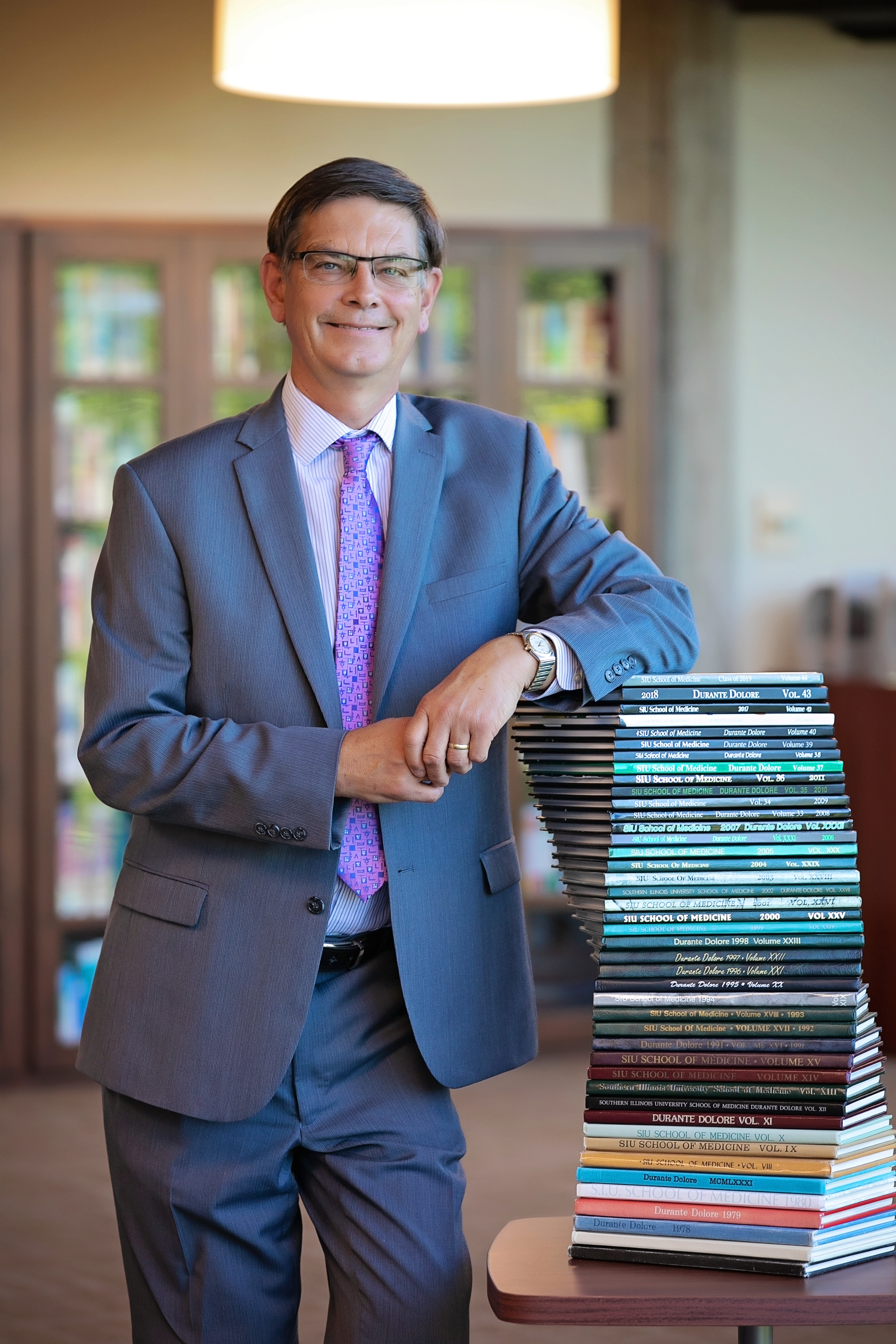 Dr. Kruse with yearbooks