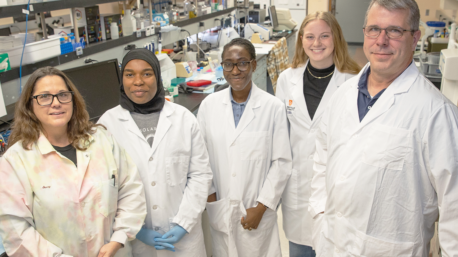 Jensik and team in lab