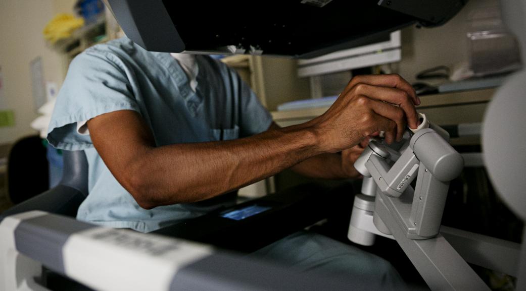 Doctor using medical equipment