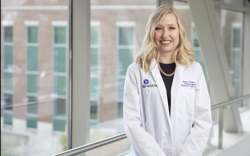 Female doctor smiling to camera