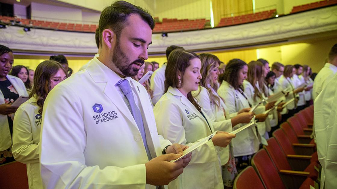 White Coat Class of '26 reads pledge