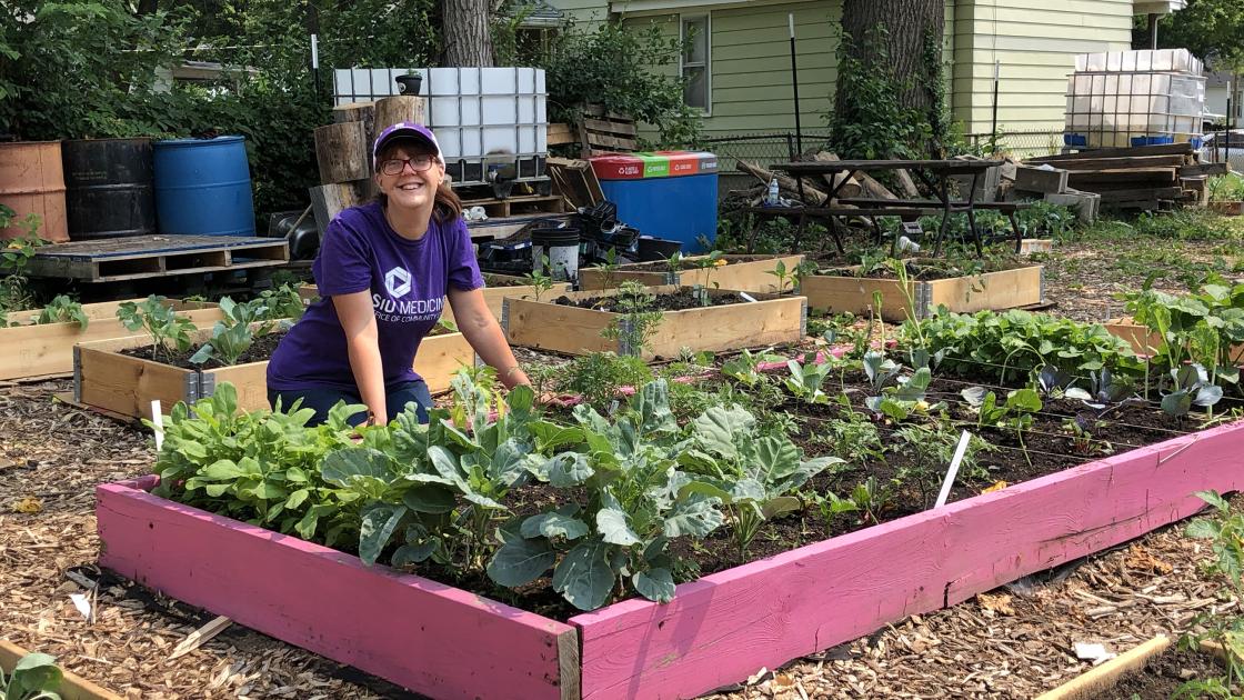 SIU Medicine staff work in community garden