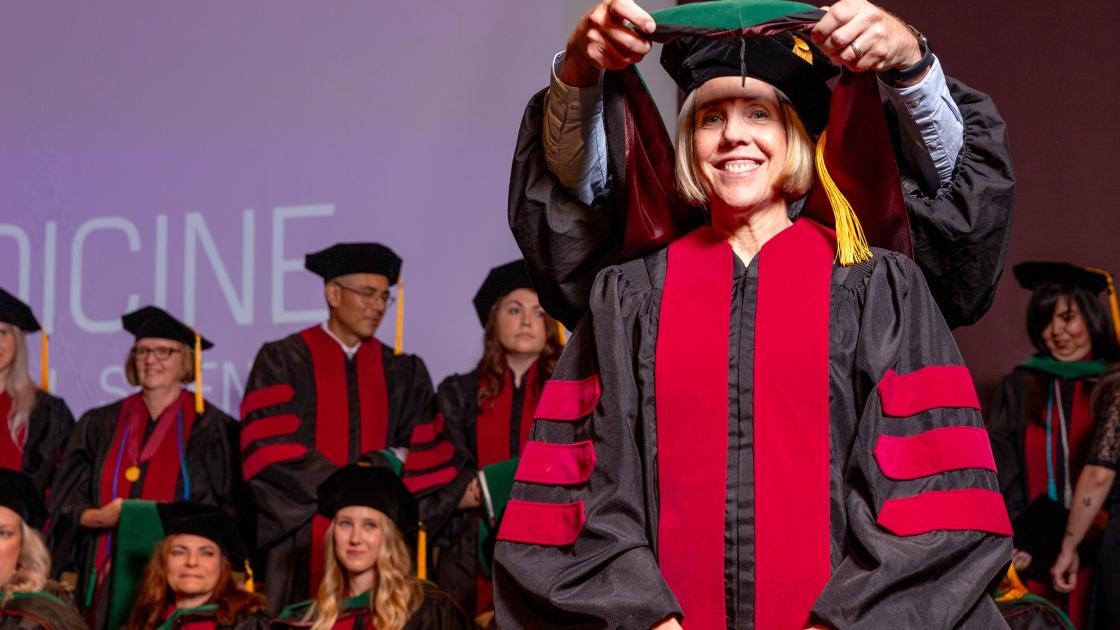 Image of Dr. Oakley at the SIU DMSc Hooding Ceremony 2023