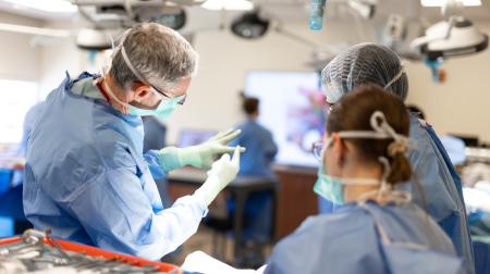 Surgical residents learning from faculty