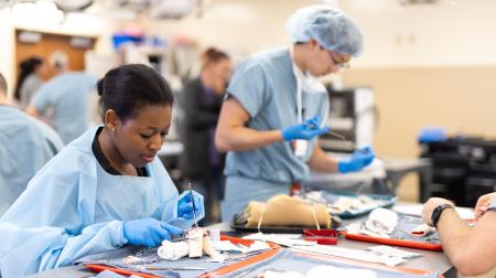 Surgical residents practicing skills