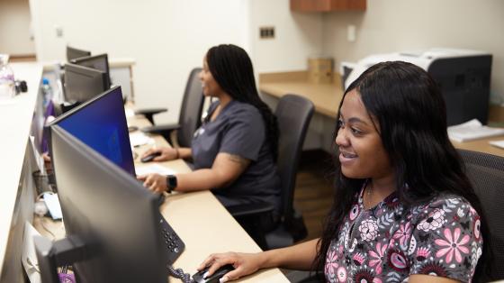 Staff completing patient information