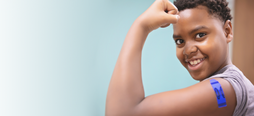 bandaid on kid arm - flu shot