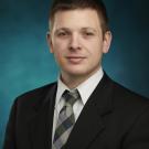 Office Manager Tom Raymond