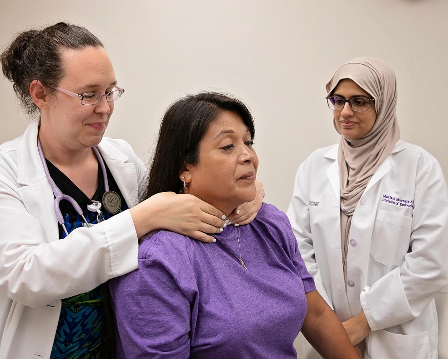 Nurses examining a woman