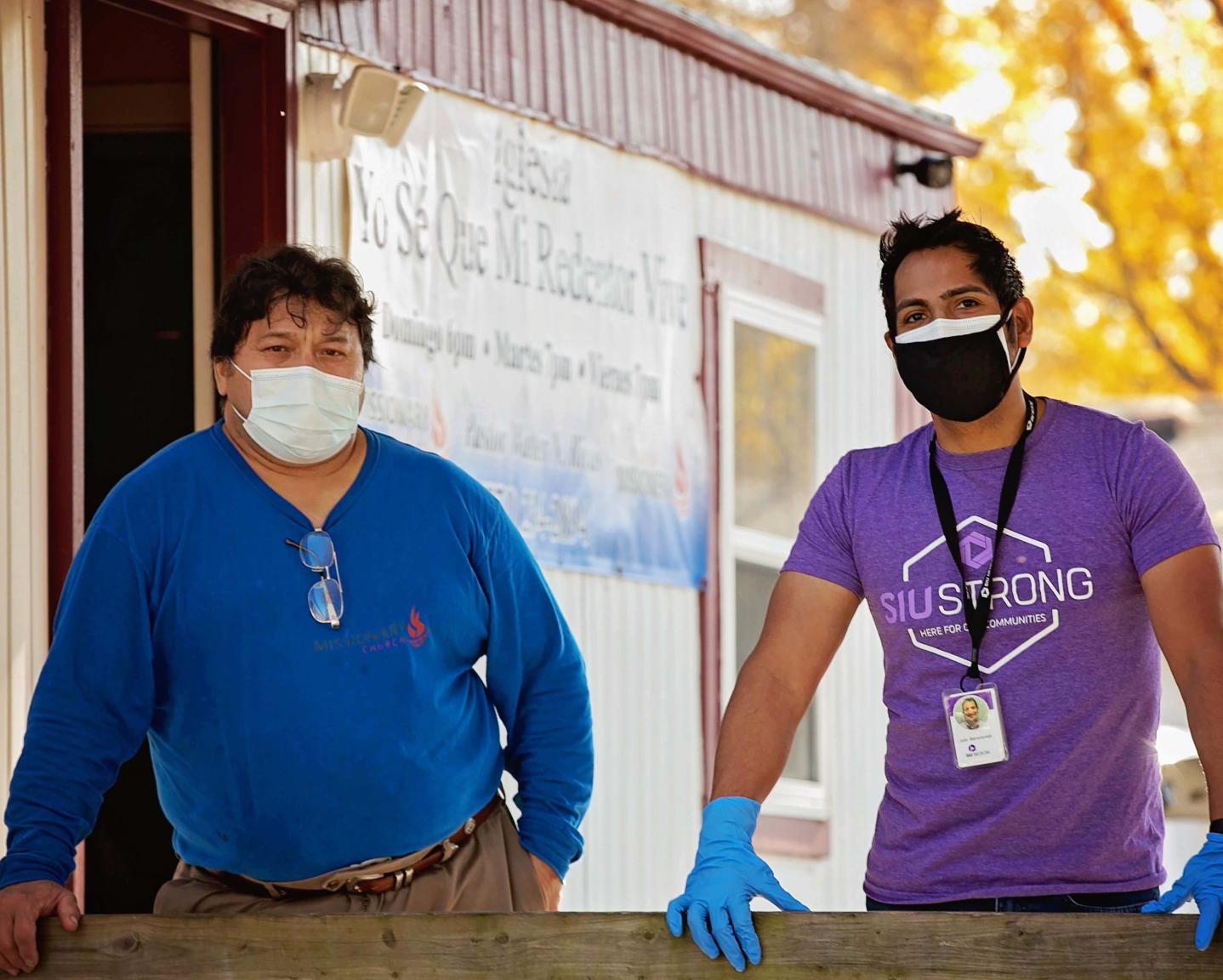 Community Health Worker Destributing COVID-19 Information