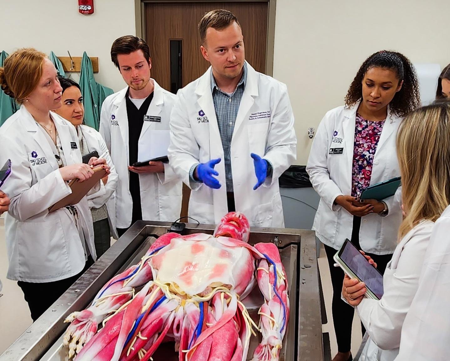Photo of Physician Assistants learning about the body