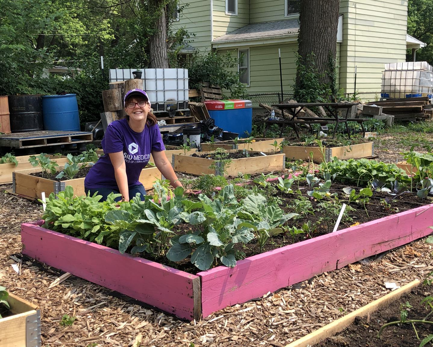 SIU Medicine staff work in community garden