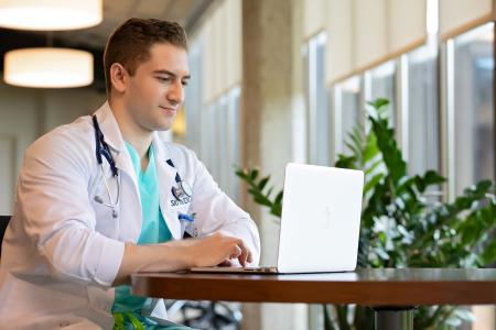 Resident at laptop
