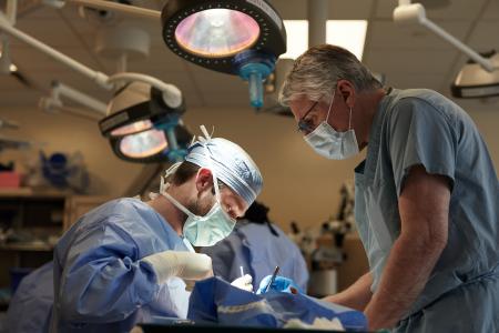 Dr. Hood supervises residents in the Surgical Skills Lab