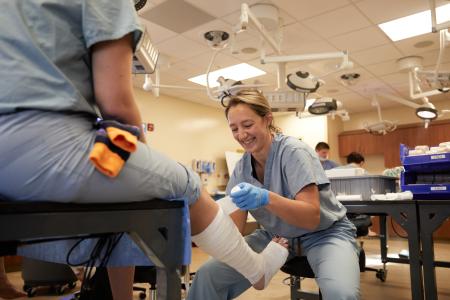 Orthopedic resident practices casting