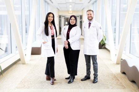 Doctors and Med student in hallway