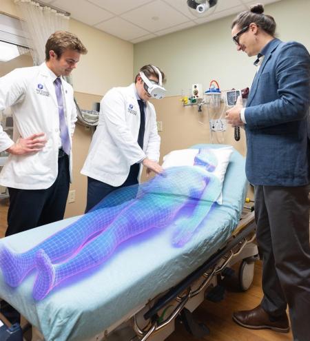 Photo of students working with AI AX - holigram