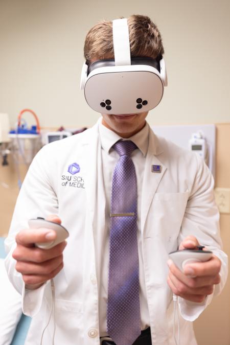 student uses XR goggles