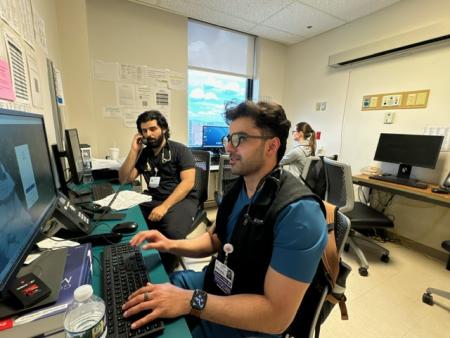 Internal Medicine residents working at computers