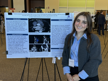 Dr. Yara Deeb, internal medicine resident, with poster presentation