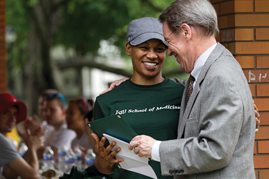 Jaleen Sims, MD, received the 2015 Excellence in Public Health Award from the U.S. Public Health Service Physician Professional Advisory Committee during the Student Day of Service lunch. Dean J. Kevin Dorsey presented her with the award, which recognizes medical students who have demonstrated a commitment to public health and public health service.