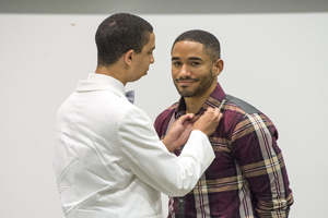 Alex Worix pins first-year student Fernando Garcia-Ramirez.